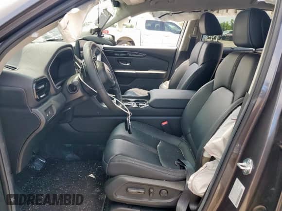 2025 Honda Pilot EX-L с VIN 5FNYG2H47SB026424, выставлен на аукционе Copart как лот 84698325 с пробегом 2 466 миль миль и Списание • Salvage title. История ставок и продаж доступна на DreamBid. Изображение 7.