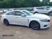 2021 Honda Accord EX-L z VIN 1HGCV1F53MA099373, wystawiony jako IAAI lot #42617799 z przebiegiem 86 548 mil mil oraz . Historia ofert i sprzedaży dostępna na DreamBid. Obrazek 13.