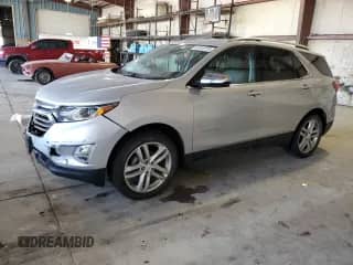 2018 Chevrolet Equinox Premier with VIN 2GNAXVEV4J6311755, listed as a Copart auction lot 67010725 with 104,590 mi miles and Salvage title. Bid and sale history available at DreamBid. Image 1.