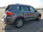 2013 Volkswagen Tiguan SE с VIN WVGAV7AX2DW023093, выставлен на аукционе Copart как лот 64694405 с пробегом 137 460 миль миль и Списание • Salvage title. История ставок и продаж доступна на DreamBid. Изображение 3.