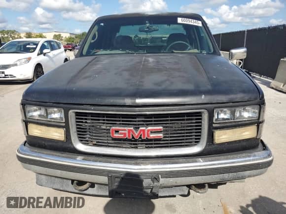 1998 GMC Sierra 1500 с VIN 1GTEC19R5WR509929, выставлен на аукционе Copart как лот 60094345 с пробегом 345 504 миль миль и Списание • Salvage title. История ставок и продаж доступна на DreamBid. Изображение 5.
