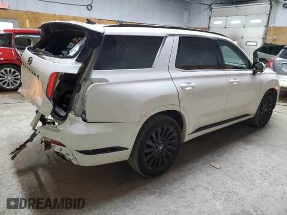 2024 Hyundai Palisade Calligraphy с VIN KM8R7DGE6RU706841, выставлен на аукционе Copart как лот 65608265 с пробегом 19 435 миль миль и На запчасти • Non repairable. История ставок и продаж доступна на DreamBid. Изображение 3.