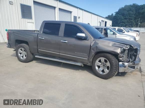 2014 Chevrolet Silverado 1500 LTZ with VIN 3GCUKSECXEG229539, listed as a Copart auction lot 81272235 with 236,690 mi miles and Salvage title. Bid and sale history available at DreamBid. Image 4.