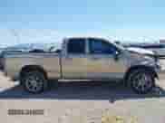 2004 Dodge 1500 SLT z VIN 1D7HU18D44J220882, wystawiony jako IAAI lot #42691488 z przebiegiem 206 416 mil mil oraz . Historia ofert i sprzedaży dostępna na DreamBid. Obrazek 13.