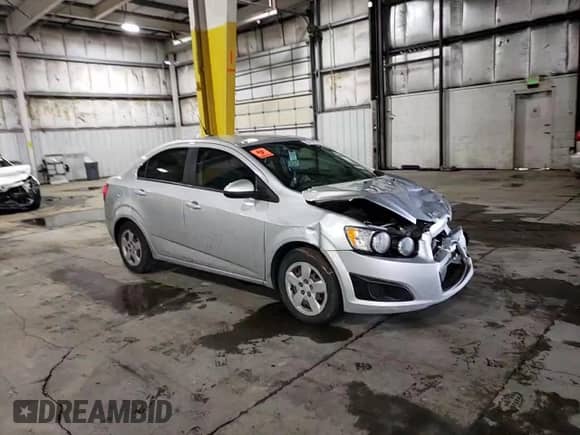 2013 Chevrolet Sonic LS с VIN 1G1JA5SH2D4225755, выставлен на аукционе Copart как лот 39410934 с пробегом 97 172 миль миль и Списание • Salvage title. История ставок и продаж доступна на DreamBid. Изображение 11.