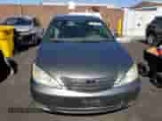 2003 Toyota Camry LE с VIN 4T1BF32K93U562415, выставлен на аукционе Copart как лот 81987345 с пробегом 171 115 миль миль и Списание • Salvage title. История ставок и продаж доступна на DreamBid. Изображение 5.