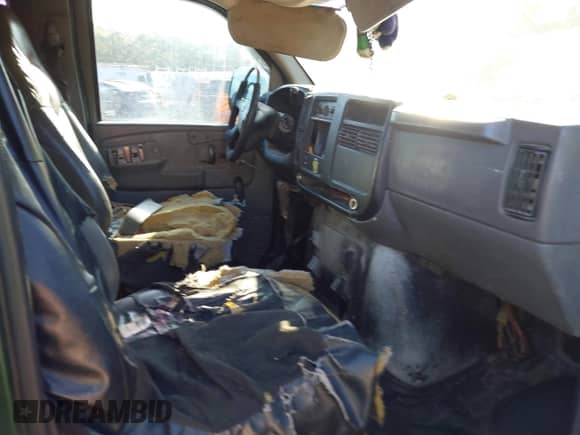 2003 Chevrolet Express Passenger with VIN 1GAHG35U631235845, listed as a IAAI auction lot 43231739 with Not provided miles and . Bid and sale history available at DreamBid. Image 5.