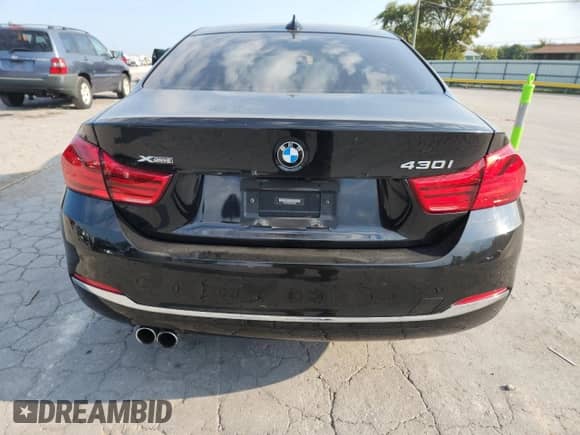 2018 BMW 4 Series 430i xDrive z VIN WBA4W5C5XJAA49884, wystawiony jako Copart lot #81122585 z przebiegiem 74 228 mil mil oraz Szkoda całkowita • Salvage title. Historia ofert i sprzedaży dostępna na DreamBid. Obrazek 6.