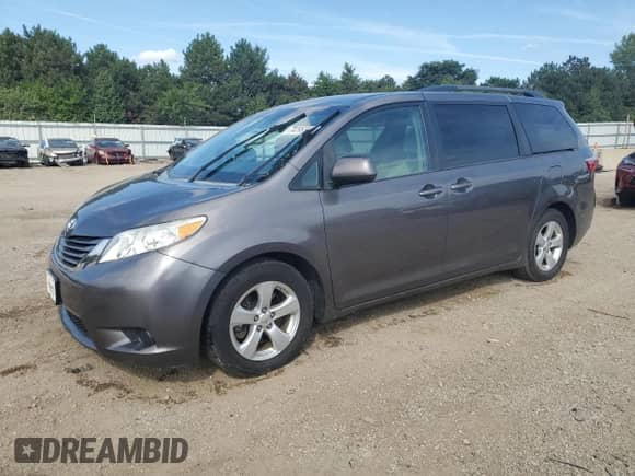 2015 Toyota Sienna LE with VIN 5TDKK3DC8FS601042, listed as a Copart auction lot 70295345 with 134,973 mi miles and Clean title. Bid and sale history available at DreamBid. Image 1.