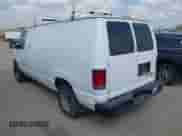 2012 Ford Econoline Cargo Commercial z VIN 1FTNE1EL3CDA23625, wystawiony jako IAAI lot #43243707 z przebiegiem 267 313 mil mil oraz . Historia ofert i sprzedaży dostępna na DreamBid. Obrazek 3.