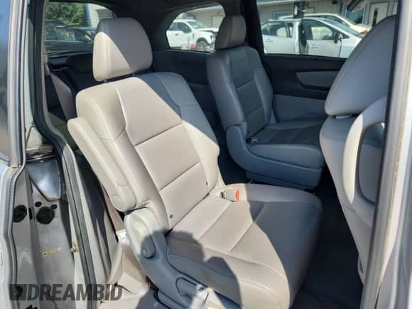 2013 Honda Odyssey EX-L z VIN 5FNRL5H68DB075203, wystawiony jako Copart lot #80362695 z przebiegiem 141 925 mil mil oraz Szkoda całkowita • Salvage title. Historia ofert i sprzedaży dostępna na DreamBid. Obrazek 11.