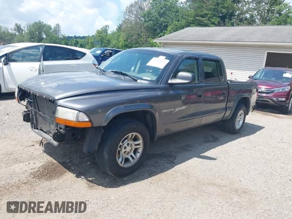 2001 Dodge Dakota Sport with VIN 1B7HL2AX01S338909, listed as a IAAI auction lot 42639655 with 111,858 mi miles and . Bid and sale history available at DreamBid. Image 2.