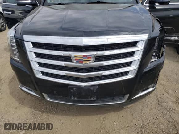 2016 Cadillac Escalade ESV z VIN 1GYS3GKJ6GR335584, wystawiony jako Copart lot #71994384 z przebiegiem Nie podano mil oraz Szkoda całkowita • Salvage title. Historia ofert i sprzedaży dostępna na DreamBid. Obrazek 12.