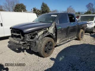 2018 Ram 1500 Tradesman z VIN 1C6RR6KG4JS141533, wystawiony jako Copart lot #49106545 z przebiegiem 152 591 mil mil oraz Szkoda całkowita • Salvage title. Historia ofert i sprzedaży dostępna na DreamBid. Obrazek 1.