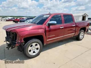 2014 Chevrolet Silverado 1500 LTZ with VIN 3GCPCSEC6EG106945, listed as a Copart auction lot 67849045 with 69,797 mi miles and Salvage title. Bid and sale history available at DreamBid. Image 1.