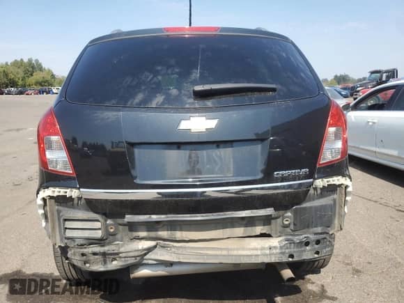 2014 Chevrolet Captiva Sport LS с VIN 3GNAL2EK6ES614530, выставлен на аукционе Copart как лот 70469195 с пробегом 129 214 миль миль и Списание • Salvage title. История ставок и продаж доступна на DreamBid. Изображение 6.