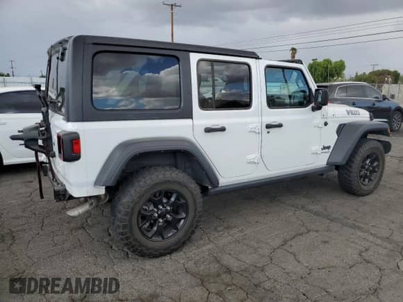 2022 Jeep Wrangler Unlimited Willys z VIN 1C4HJXDN3NW263019, wystawiony jako Copart lot #80933014 z przebiegiem 16 231 mil mil oraz Szkoda całkowita • Salvage title. Historia ofert i sprzedaży dostępna na DreamBid. Obrazek 3.
