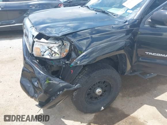 2010 Toyota Tacoma PreRunner z VIN 3TMJU4GN9AM098977, wystawiony jako IAAI lot #42642799 z przebiegiem 206 056 mil mil oraz . Historia ofert i sprzedaży dostępna na DreamBid. Obrazek 6.