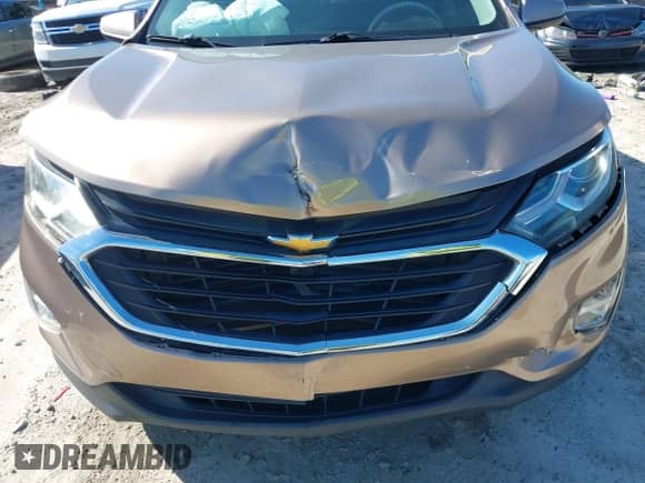 2018 Chevrolet Equinox LT with VIN 2GNAXJEV6J6333880, listed as a IAAI auction lot 43115901 with 108,343 mi miles and . Bid and sale history available at DreamBid. Image 6.