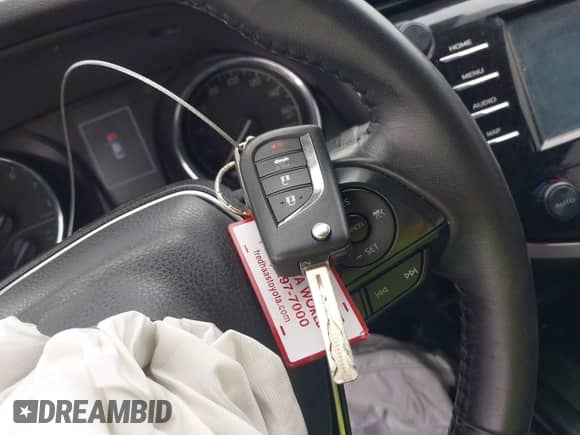 2020 Toyota Camry SE with VIN 4T1G11AK4LU955992, listed as a IAAI auction lot 43027088 with 77,002 mi miles and . Bid and sale history available at DreamBid. Image 11.