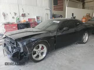 2010 Dodge Challenger R/T with VIN 2B3CJ5DT2AH241231, listed as a Copart auction lot 69096995 with 69,967 mi miles and Salvage title. Bid and sale history available at DreamBid. Image 1.