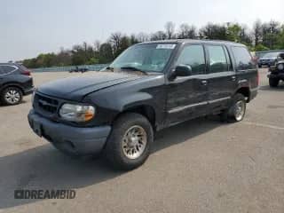 2000 Ford Explorer XLS with VIN 1FMZU72X7YUA74692, listed as a Copart auction lot 59775115 with 158,115 mi miles and Salvage title. Bid and sale history available at DreamBid. Image 1.