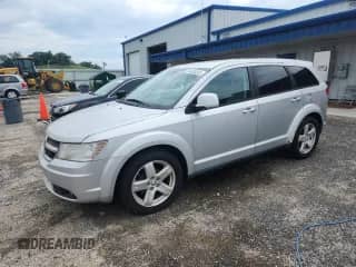 2009 Dodge Journey SXT with VIN 3D4GH57V89T584186, listed as a Copart auction lot 64393385 with 160,570 mi miles and Non repairable. Bid and sale history available at DreamBid. Image 1.