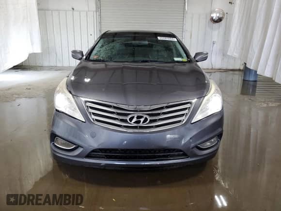 2013 Hyundai Azera z VIN KMHFH4JG2DA321197, wystawiony jako Copart lot #65585084 z przebiegiem 158 956 mil mil oraz Szkoda całkowita • Salvage title. Historia ofert i sprzedaży dostępna na DreamBid. Obrazek 5.