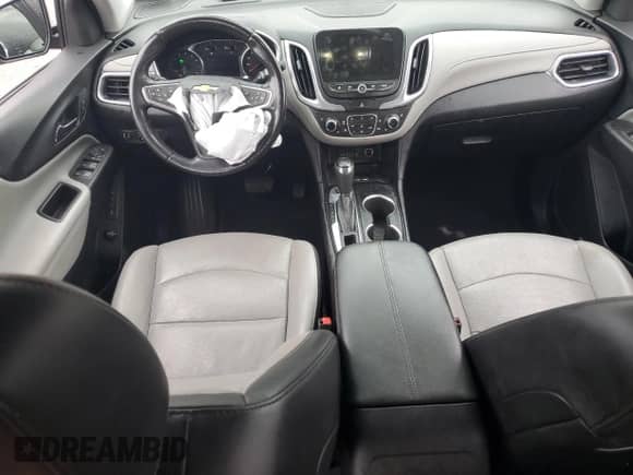 2020 Chevrolet Equinox Premier z VIN 2GNAXXEV2L6121712, wystawiony jako Copart lot #66229645 z przebiegiem 51 397 mil mil oraz Szkoda całkowita • Salvage title. Historia ofert i sprzedaży dostępna na DreamBid. Obrazek 8.