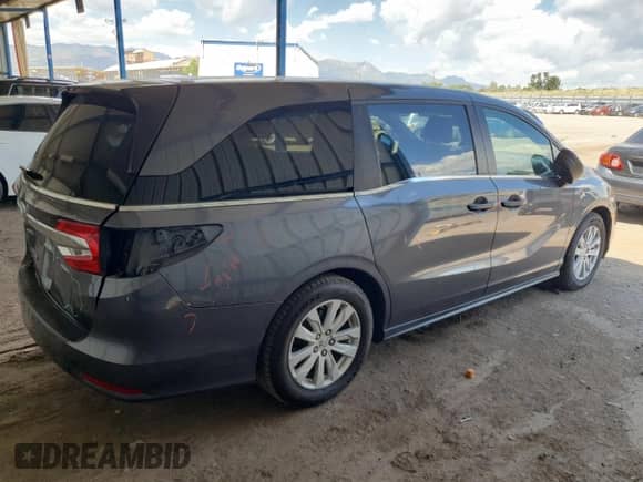 2018 Honda Odyssey LX with VIN 5FNRL6H20JB086713, listed as a Copart auction lot 68504455 with 92,823 mi miles and Salvage title. Bid and sale history available at DreamBid. Image 3.