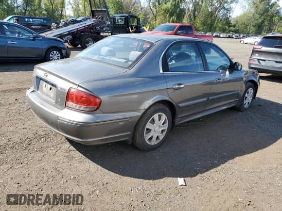 2002 Hyundai Sonata z VIN KMHWF25S32A594803, wystawiony jako Copart lot #80190965 z przebiegiem 184 450 mil mil oraz Szkoda całkowita • Salvage title. Historia ofert i sprzedaży dostępna na DreamBid. Obrazek 3.