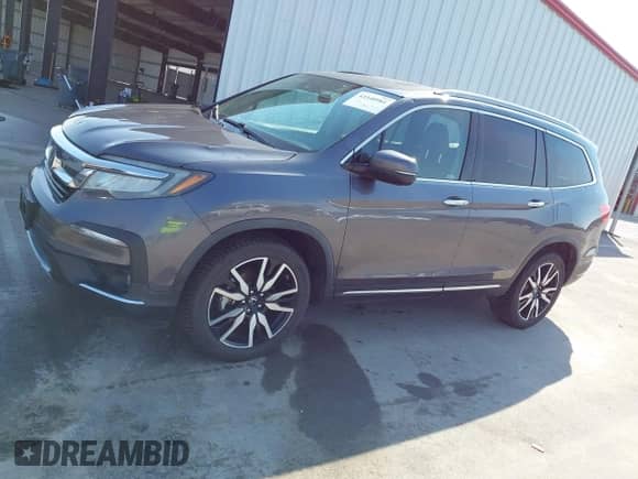 2019 Honda Pilot Touring 7-Passenger z VIN 5FNYF6H64KB003422, wystawiony jako IAAI lot #43340981 z przebiegiem 86 350 mil mil oraz . Historia ofert i sprzedaży dostępna na DreamBid. Obrazek 14.
