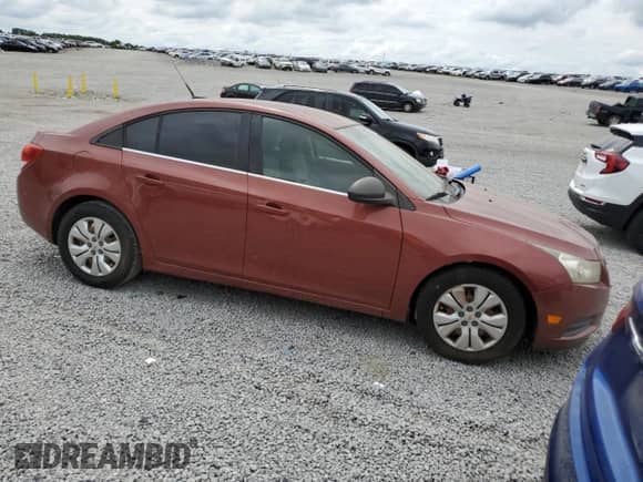 2012 Chevrolet Cruze LS с VIN 1G1PC5SH7C7279022, выставлен на аукционе Copart как лот 70030275 с пробегом 173 384 миль миль и Списание • Salvage title. История ставок и продаж доступна на DreamBid. Изображение 4.