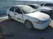 1999 Chevrolet Prizm with VIN 1Y1SK5286XZ441300, listed as a Copart auction lot 43013045 with 253,632 mi miles and Salvage title. Bid and sale history available at DreamBid. Image 4.