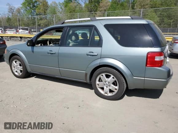 2006 Ford Freestyle Limited with VIN 1FMDK06126GA29846, listed as a Copart auction lot 54138325 with 151,935 mi miles and Salvage title. Bid and sale history available at DreamBid. Image 2.