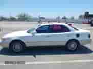 1996 Toyota Camry LE z VIN JT2BF12K9T0172942, wystawiony jako IAAI lot #43023485 z przebiegiem 294 899 mil mil oraz . Historia ofert i sprzedaży dostępna na DreamBid. Obrazek 14.