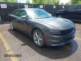 2022 Dodge Charger SXT with VIN 2C3CDXJG7NH186861, listed as a IAAI auction lot 42390435 with 68,086 mi miles and . Bid and sale history available at DreamBid. Image 1.