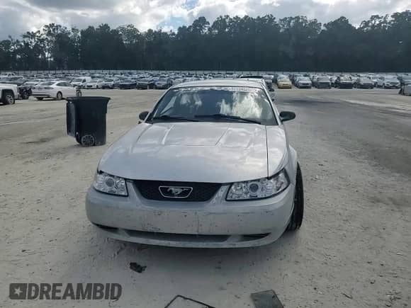 2003 Ford Mustang Standard z VIN 1FAFP40453F317652, wystawiony jako Copart lot #82534525 z przebiegiem 190 003 mil mil oraz Szkoda całkowita • Salvage title. Historia ofert i sprzedaży dostępna na DreamBid. Obrazek 13.