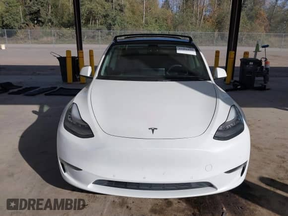 2021 Tesla Model Y Long Range with VIN 5YJYGDEE6MF138868, listed as a IAAI auction lot 43401839 with 134,786 mi miles and . Bid and sale history available at DreamBid. Image 13.
