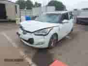 2013 Hyundai Veloster w/Black Int z VIN KMHTC6AD0DU155604, wystawiony jako IAAI lot #43314820 z przebiegiem 141 866 mil mil oraz . Historia ofert i sprzedaży dostępna na DreamBid. Obrazek 18.