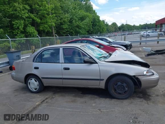 2002 Chevrolet Prizm z VIN 1Y1SK52802Z408768, wystawiony jako IAAI lot #42241540 z przebiegiem 276 083 mil mil oraz . Historia ofert i sprzedaży dostępna na DreamBid. Obrazek 13.