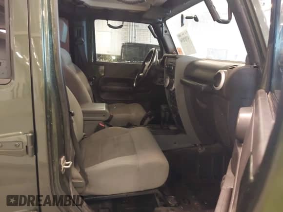 2008 Jeep Wrangler Unlimited Sahara with VIN 1J4GA59158L504309, listed as a IAAI auction lot 43292936 with 147,545 mi miles and . Bid and sale history available at DreamBid. Image 5.