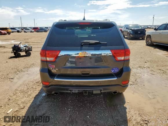 2011 Jeep Grand Cherokee Overland with VIN 1J4RR6GT7BC722383, listed as a Copart auction lot 80467695 with 135,083 mi miles and Salvage title. Bid and sale history available at DreamBid. Image 6.