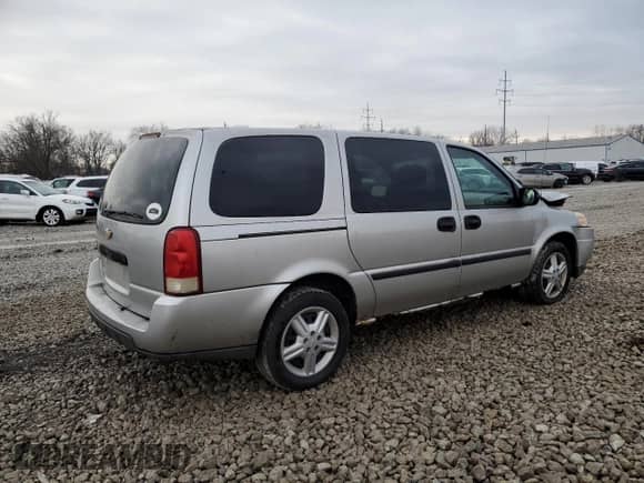 2005 Chevrolet Uplander с VIN 1GNDV03L75D243403, выставлен на аукционе Copart как лот 86212154 с пробегом 150 306 миль миль и Списание • Salvage title. История ставок и продаж доступна на DreamBid. Изображение 3.