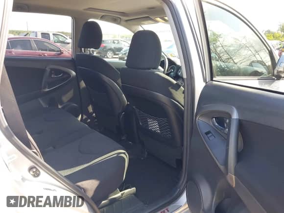 2011 Toyota RAV4 Sport with VIN JTMRF4DV7B5037989, listed as a IAAI auction lot 43180630 with 122,013 mi miles and . Bid and sale history available at DreamBid. Image 8.