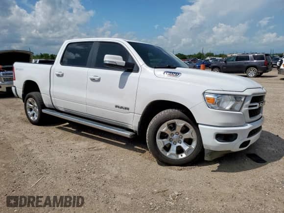 2020 Ram 1500 Lone Star with VIN 1C6RREFM0LN245982, listed as a Copart auction lot 61289665 with 97,036 mi miles and Salvage title. Bid and sale history available at DreamBid. Image 4.