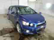 2013 Chevrolet Sonic LTZ с VIN 1G1JE6SB8D4223594, выставлен на аукционе Copart как лот 55657765 с пробегом 180 407 миль миль и Списание • Salvage title. История ставок и продаж доступна на DreamBid. Изображение 13.