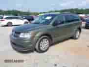 2017 Dodge Journey SE with VIN 3C4PDCAB4HT691553, listed as a IAAI auction lot 42613357 with 69,267 mi miles and . Bid and sale history available at DreamBid. Image 2.