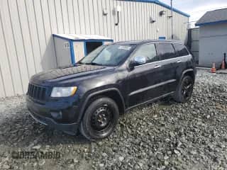 2012 Jeep Grand Cherokee Overland z VIN 1C4RJFCT7CC171327, wystawiony jako Copart lot #85351575 z przebiegiem 162 661 mil mil oraz Czysty tytuł • Clean title. Historia ofert i sprzedaży dostępna na DreamBid. Obrazek 1.