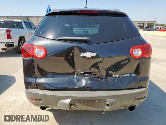 2012 Chevrolet Traverse LTZ with VIN 1GNKRLED2CJ340087, listed as a Copart auction lot 72054655 with 187,443 mi miles and Salvage title. Bid and sale history available at DreamBid. Image 6.